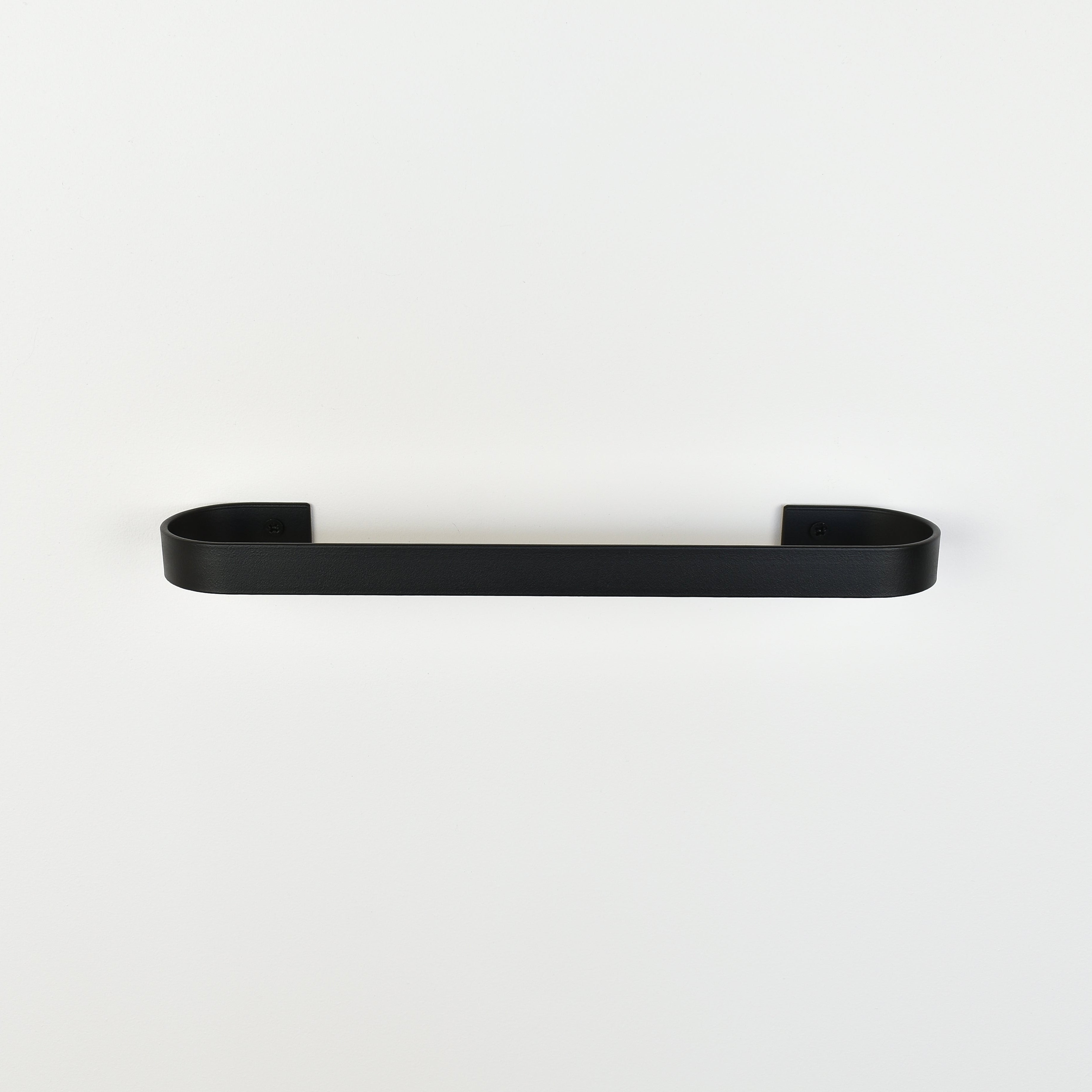 black metal towel rack on a white background