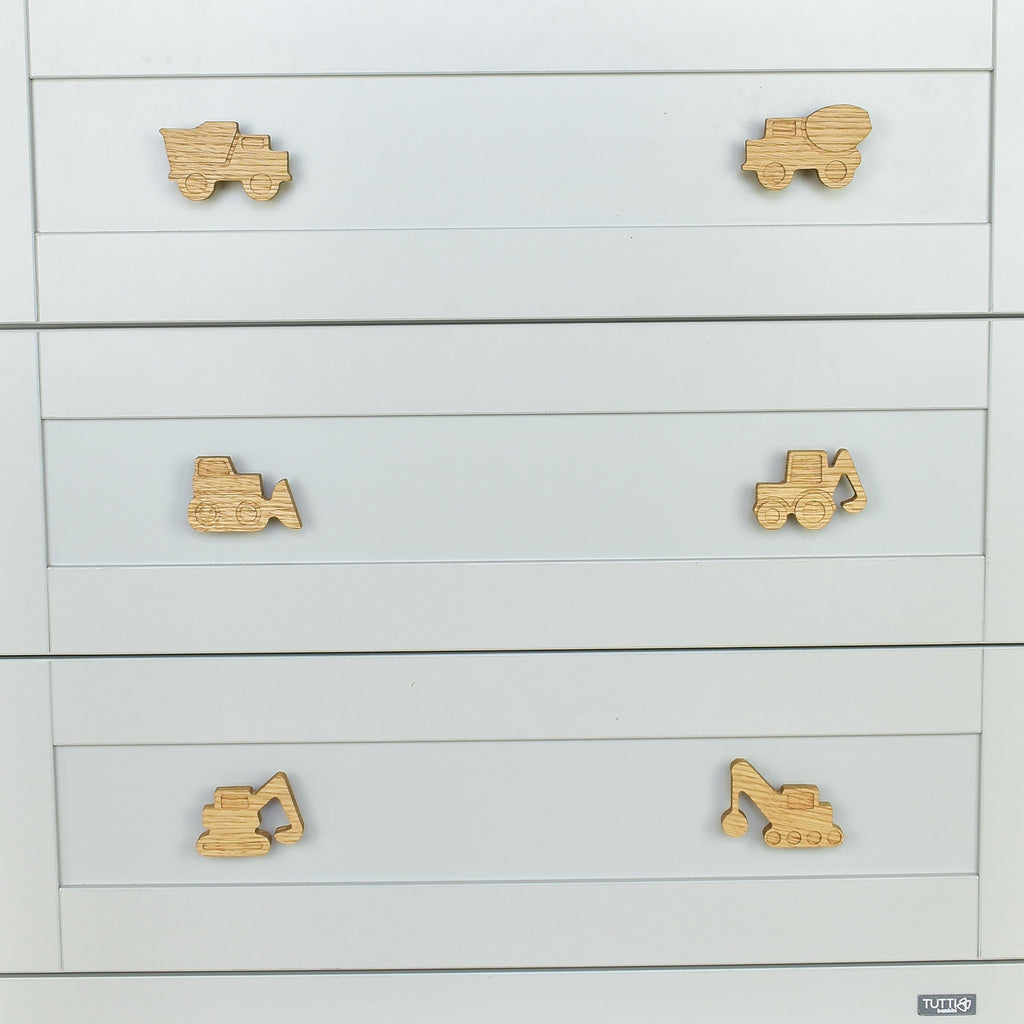 Construction vehicle drawer knobs close-up front view - Dump truck Cement truck Bulldozer Tractor Excavator Crane