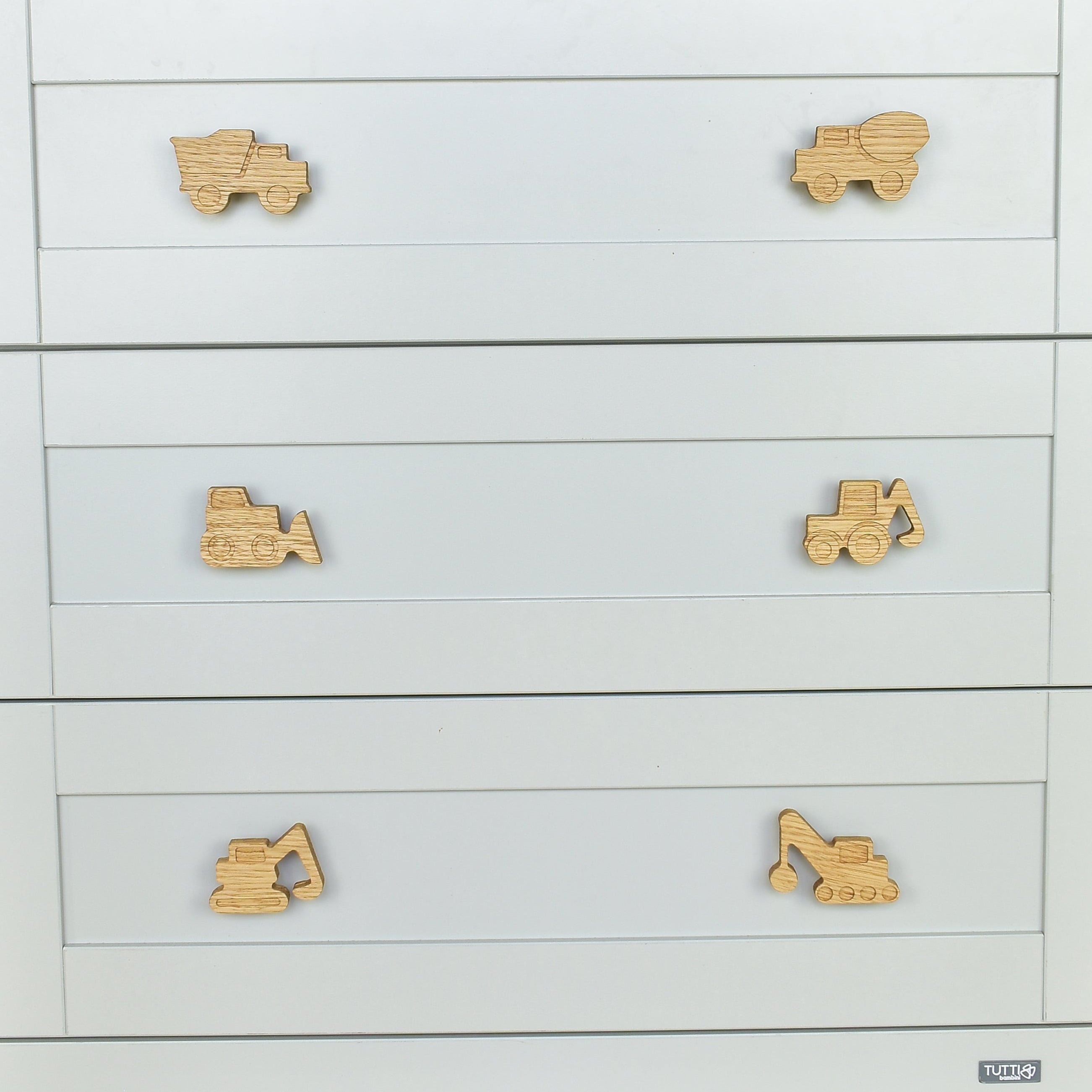 Construction vehicle drawer knobs close-up front view - Dump truck Cement truck Bulldozer Tractor Excavator Crane