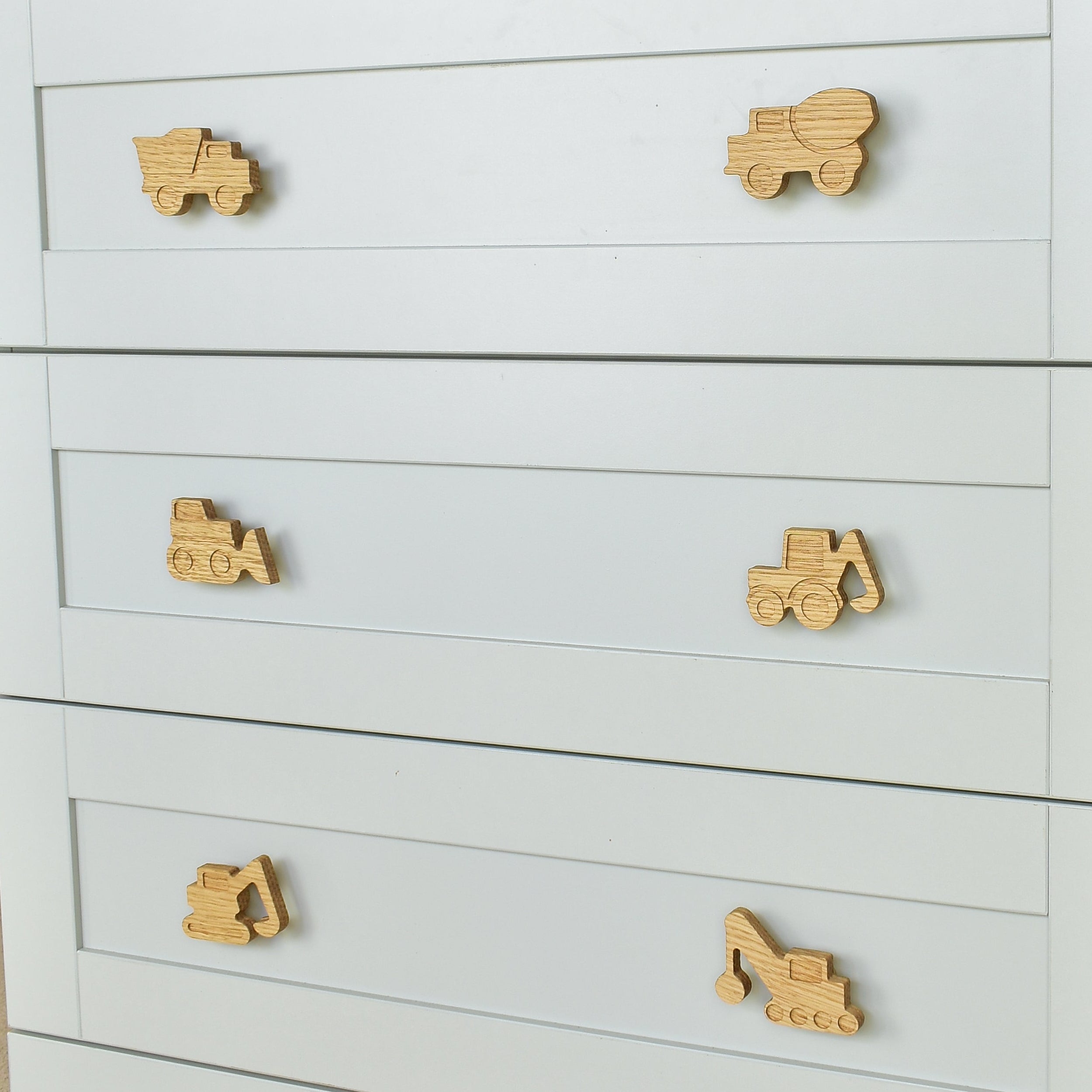 Construction vehicle drawer knobs close-up right angle - Dump truck Cement truck Bulldozer Tractor Excavator Crane