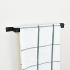 Black towel rail left side view with tea towel -modern metal towel holder