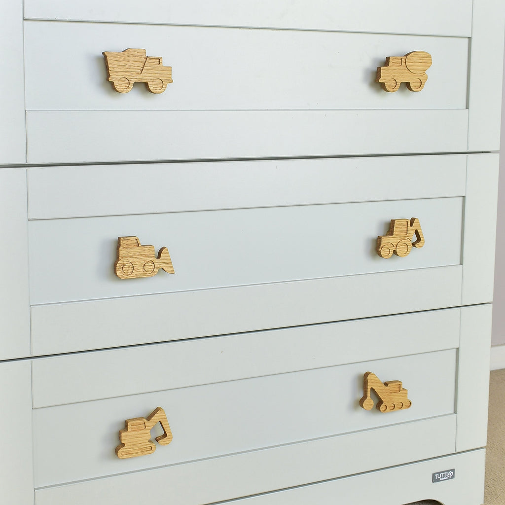 Construction vehicle drawer knobs close-up left angle - Dump truck Cement truck Bulldozer Tractor Excavator Crane oak