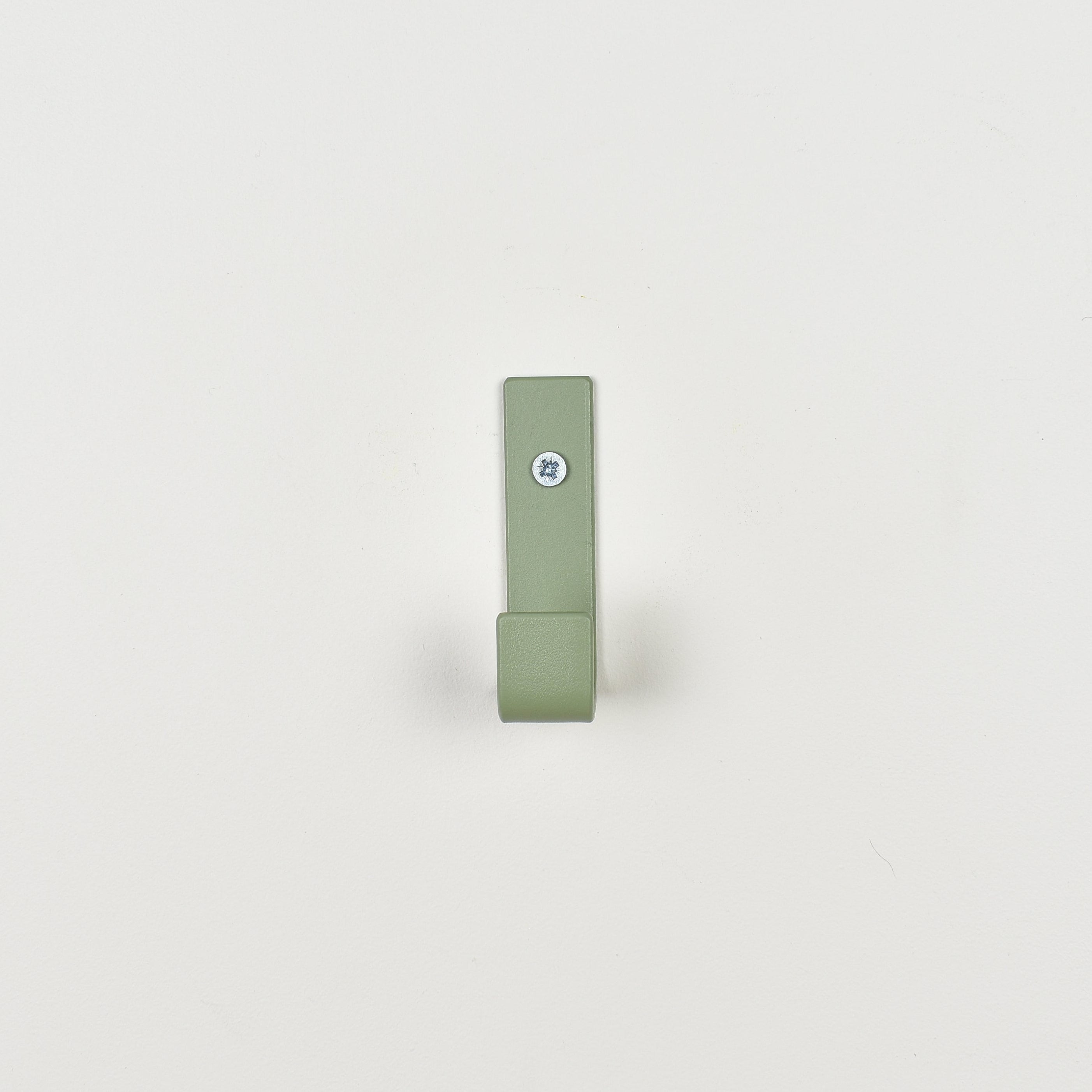 Colourful steel wall hook close-up front view - coat hook detail kids nursery