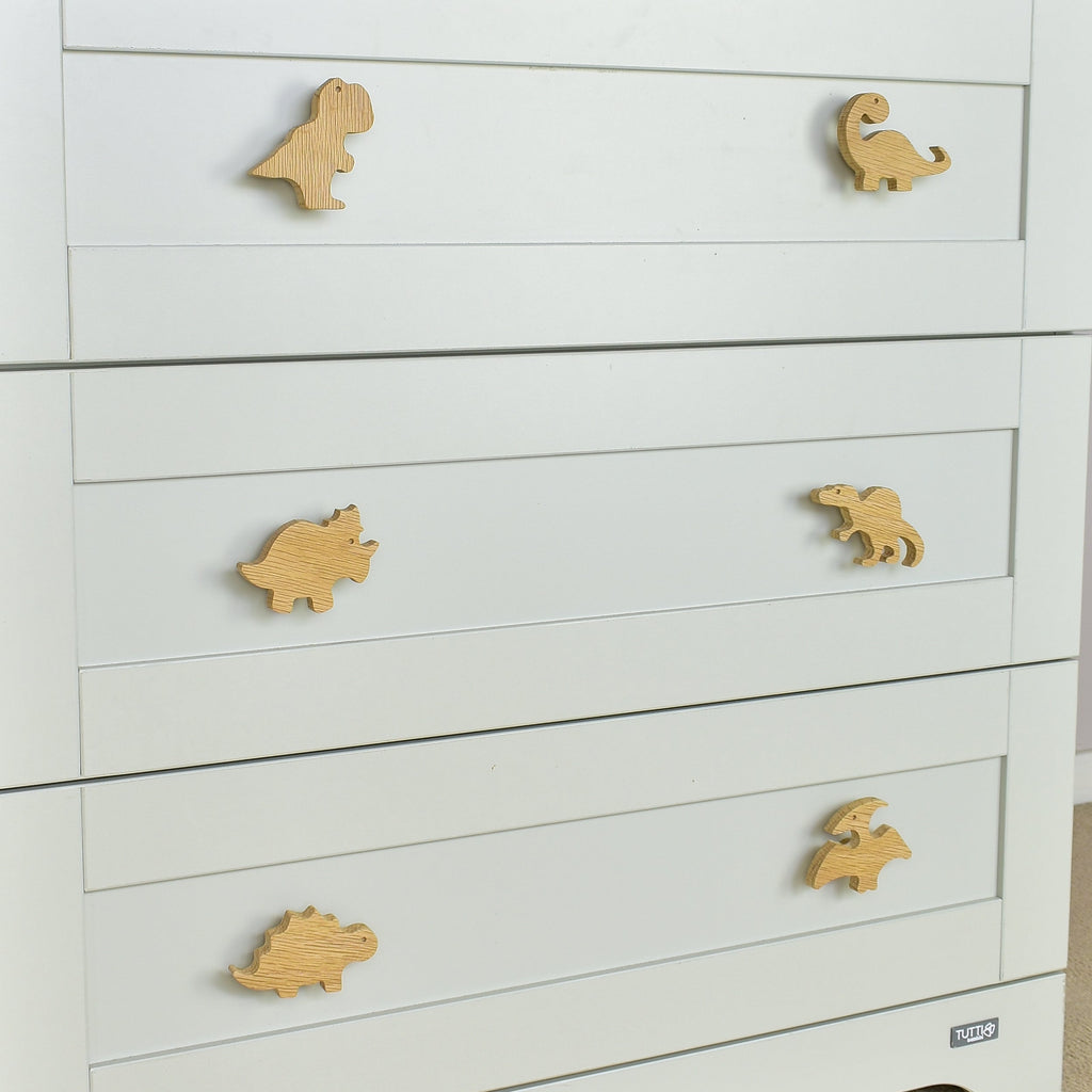 Dinosaur drawer knobs close-up left angle - T-rex Brachiosaurus Triceratops Spinosaurus Stegosaurus Pterodactyl