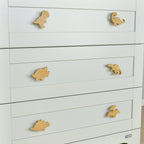 Dinosaur drawer knobs close-up left angle - T-rex Brachiosaurus Triceratops Spinosaurus Stegosaurus Pterodactyl