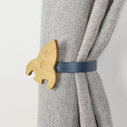 Space curtain tieback right side view - Rocket oak tieback for kids