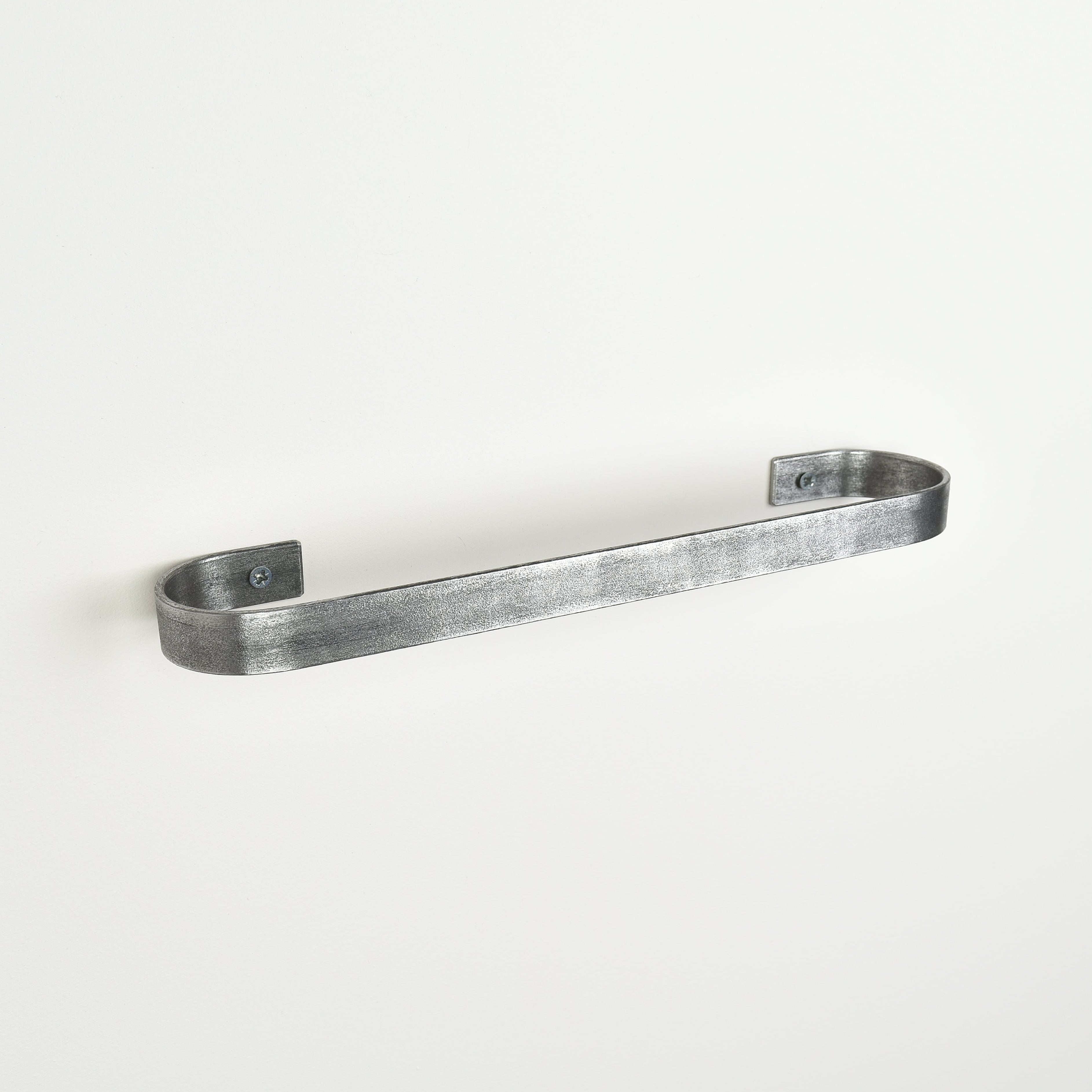 pewter metal towel rack on a white background - left view