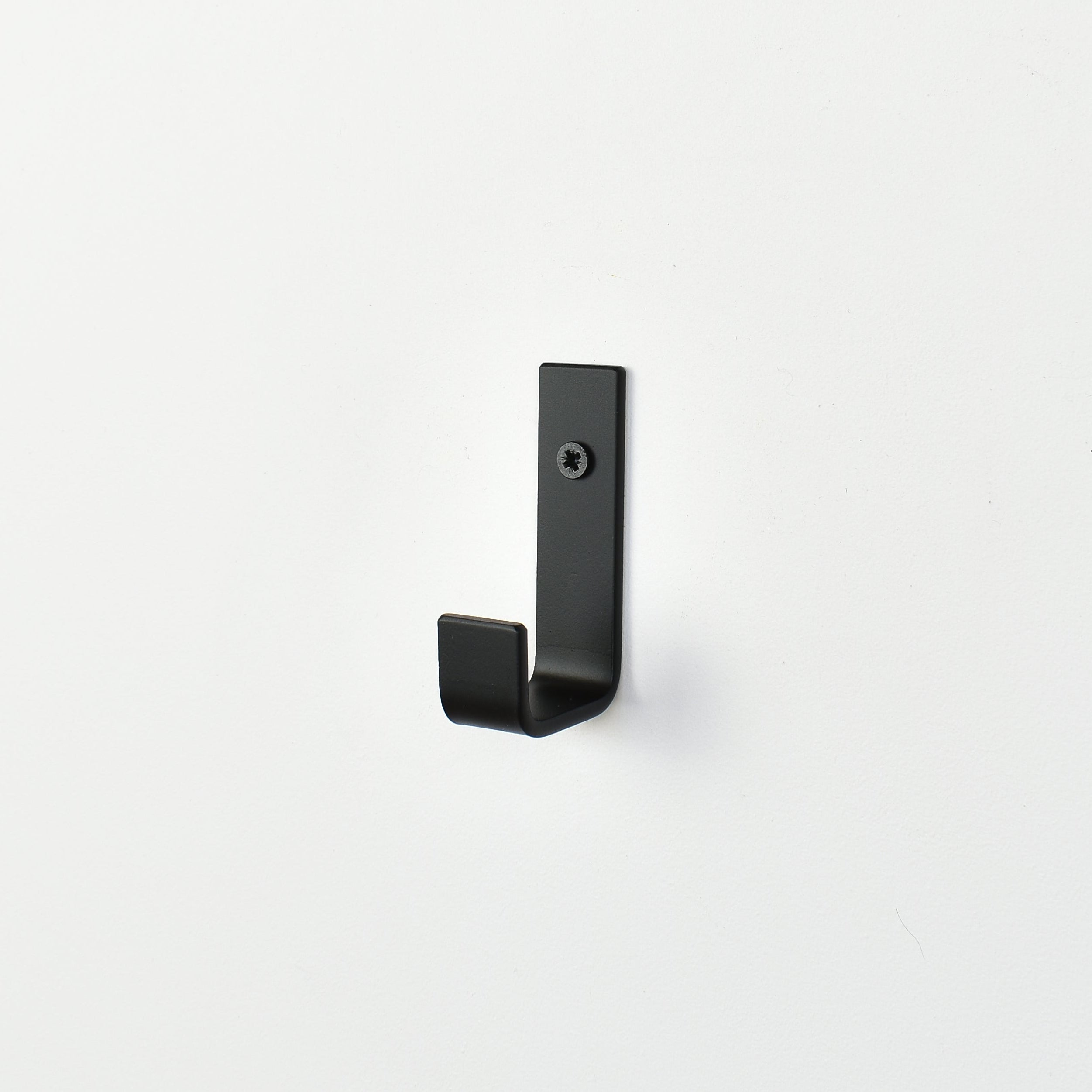 Black wall hook right side view - steel construction with black finish