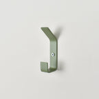 Double colourful wall hook close-up right view - steel coat hook detail kids nursery