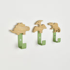 Dinosaur wall hooks side angle -  Spinosaurus Stegosaurus Pterodactyl oak nursery decor