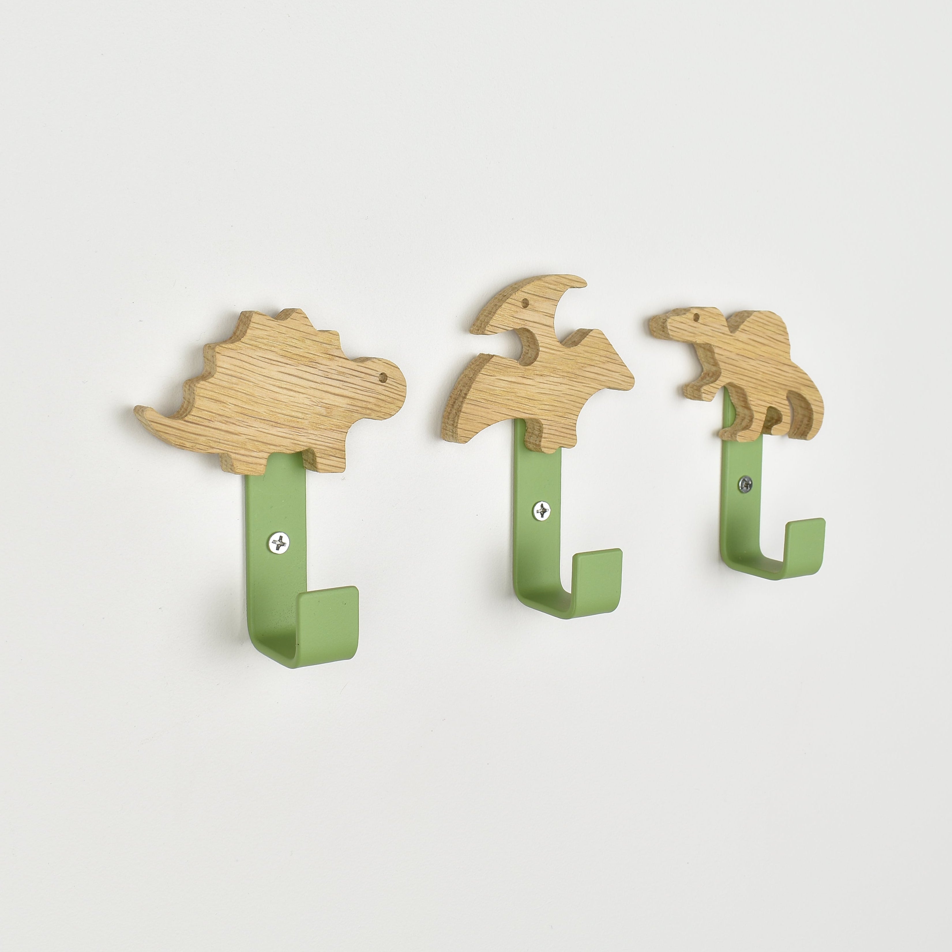 Dinosaur wall hooks side angle -  Spinosaurus Stegosaurus Pterodactyl oak nursery decor