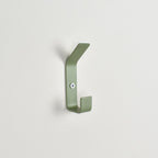 Double colourful wall hook close-up left view - steel coat hook detail kids nursery