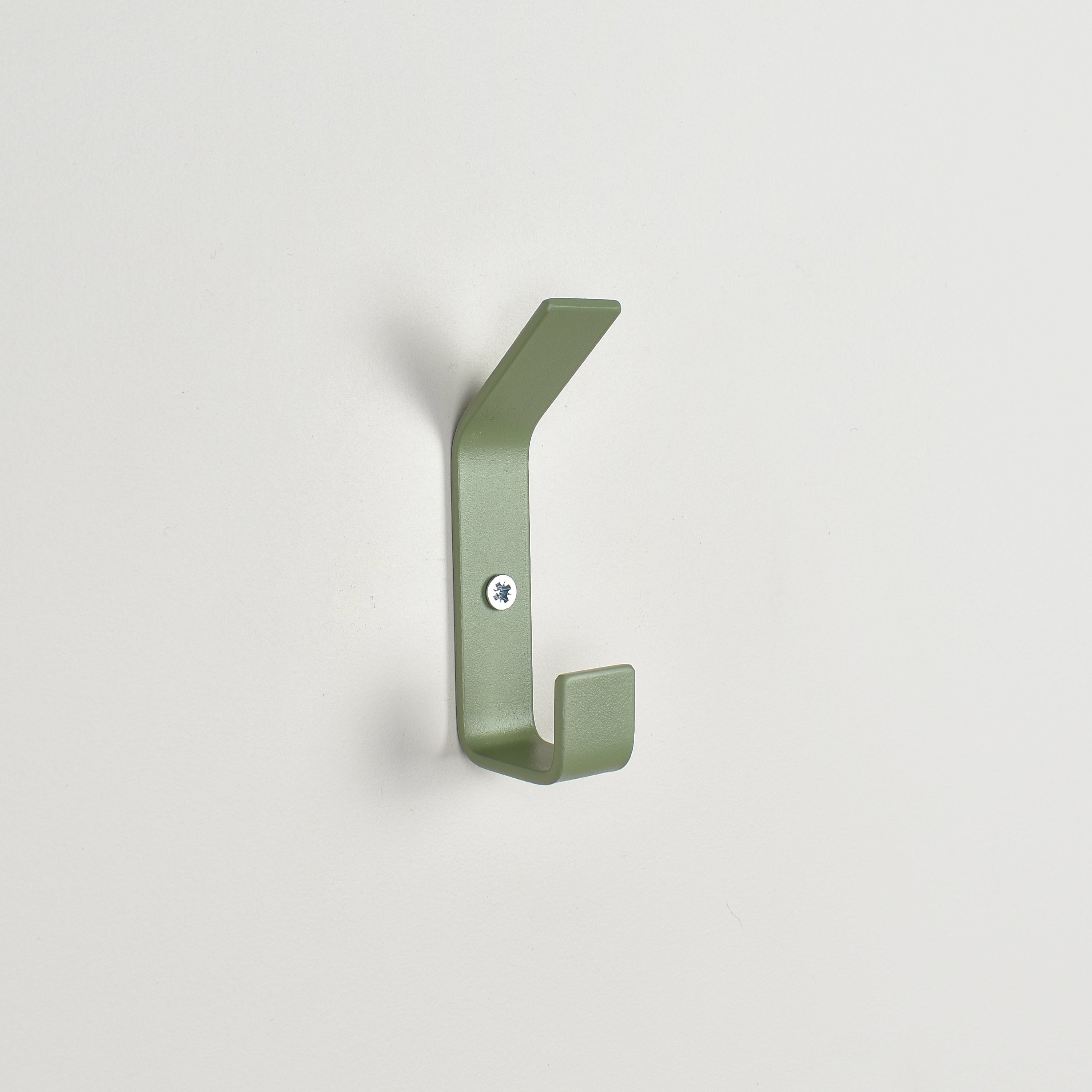 Double colourful wall hook close-up left view - steel coat hook detail kids nursery