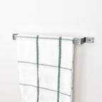 Pewter towel rail right side view with tea towel - industrial metal towel holder