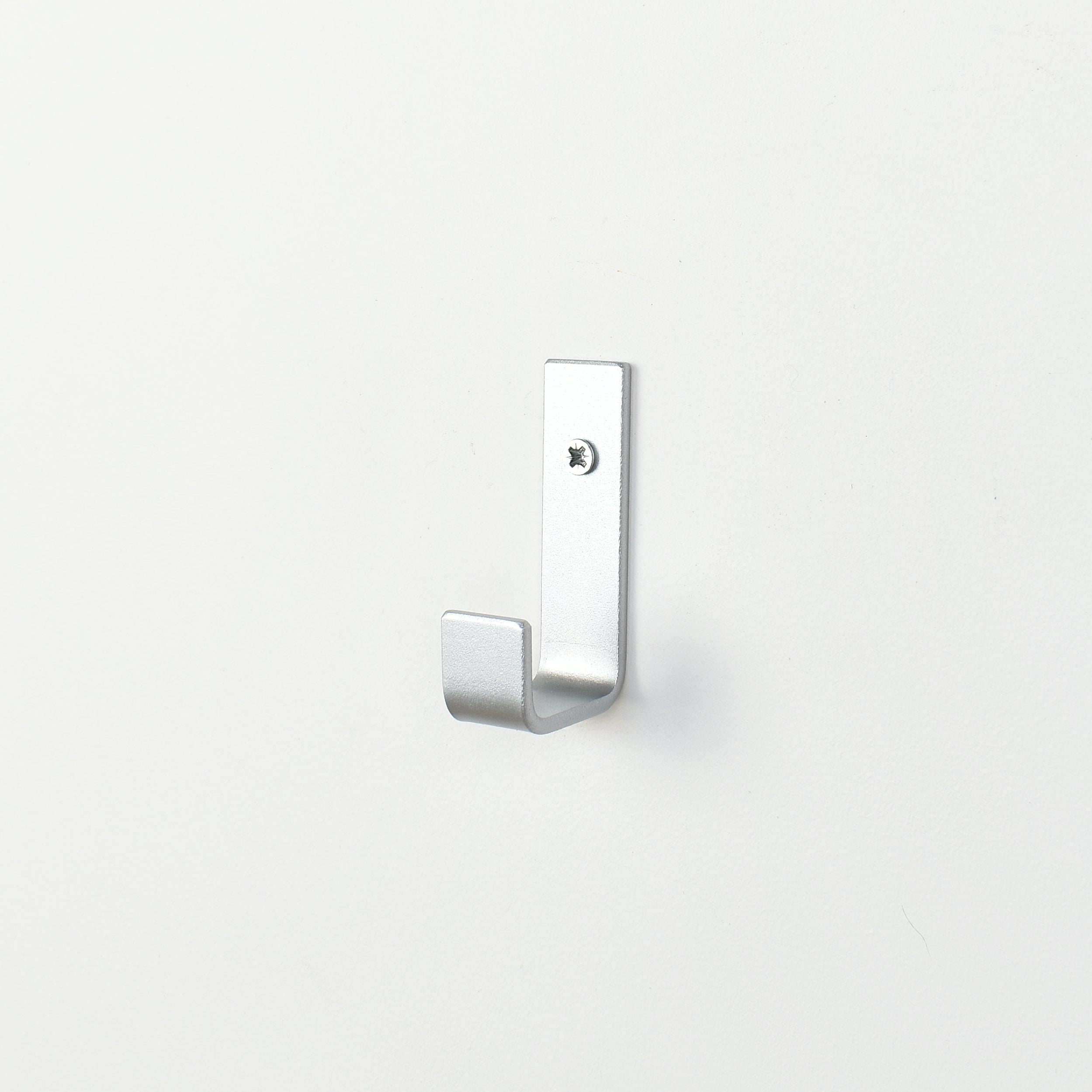 Silver wall hook side view - steel construction with metallic silver finish