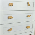 Safari animal drawer knobs close-up left angle - Elephant Giraffe Rhino Crocodile Lion Hippo oak