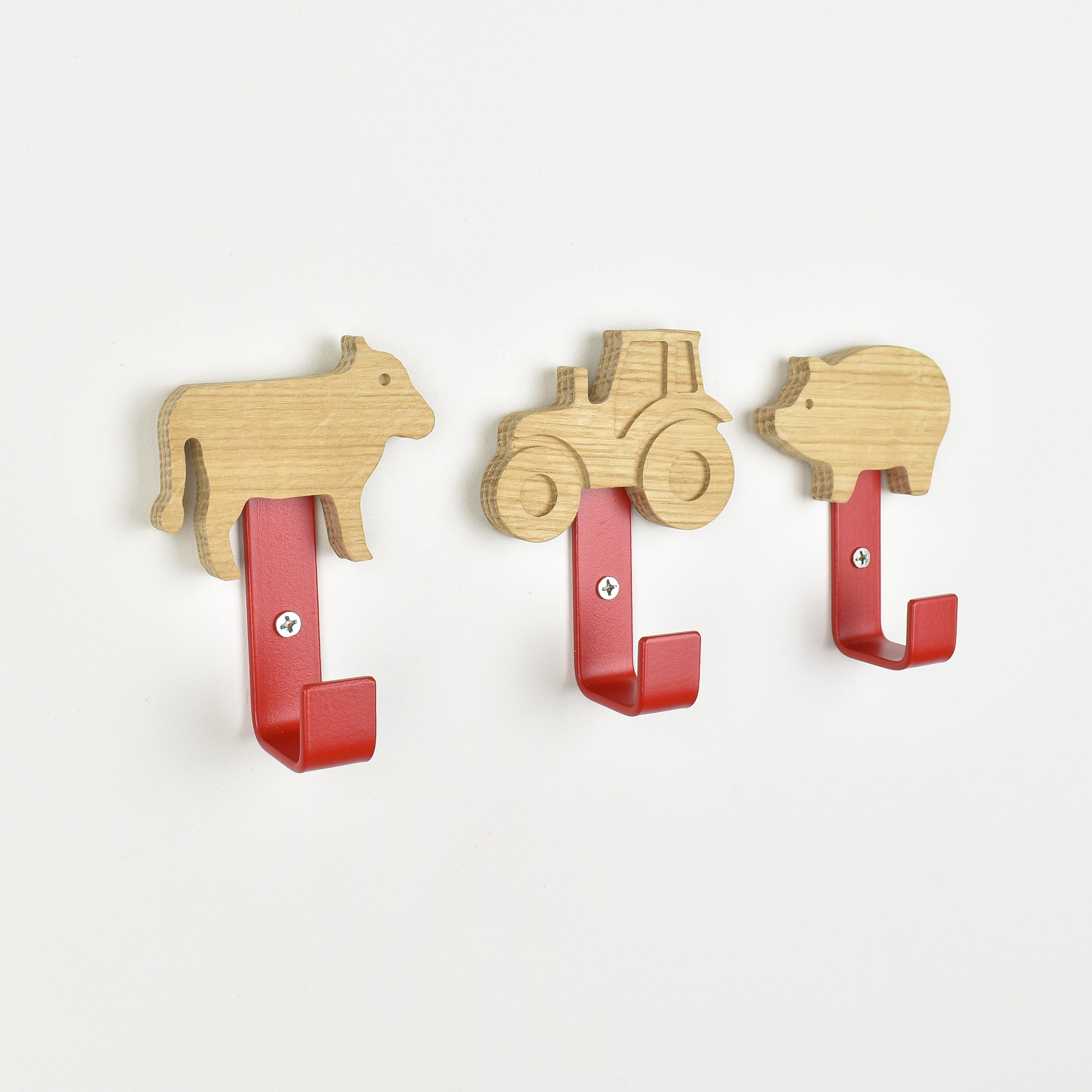 Farmyard theme wall hooks side angle - cow tractor pig oak bedroom decor