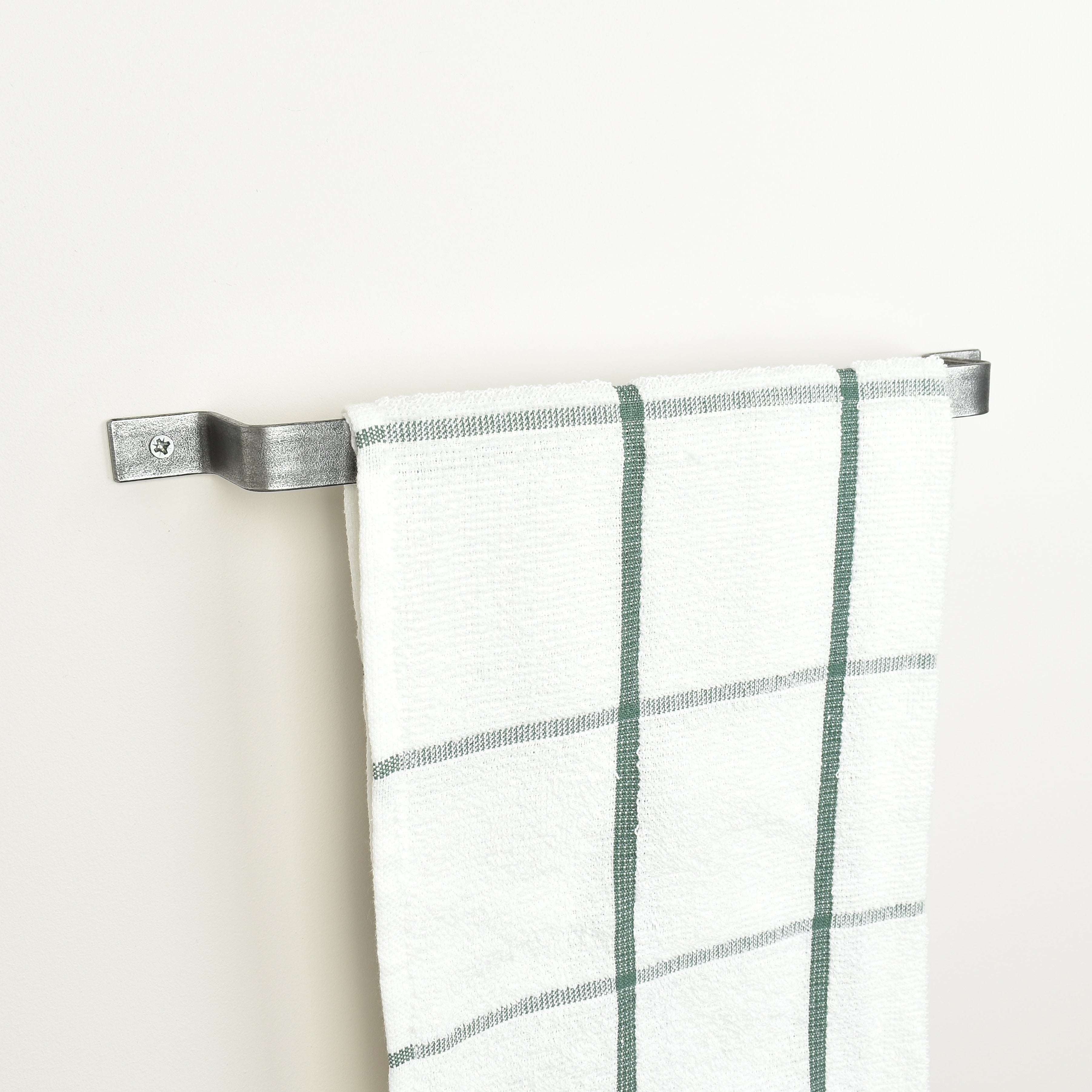 Pewter towel rail left side view with tea towel - metal towel holder for kitchen and bathroom