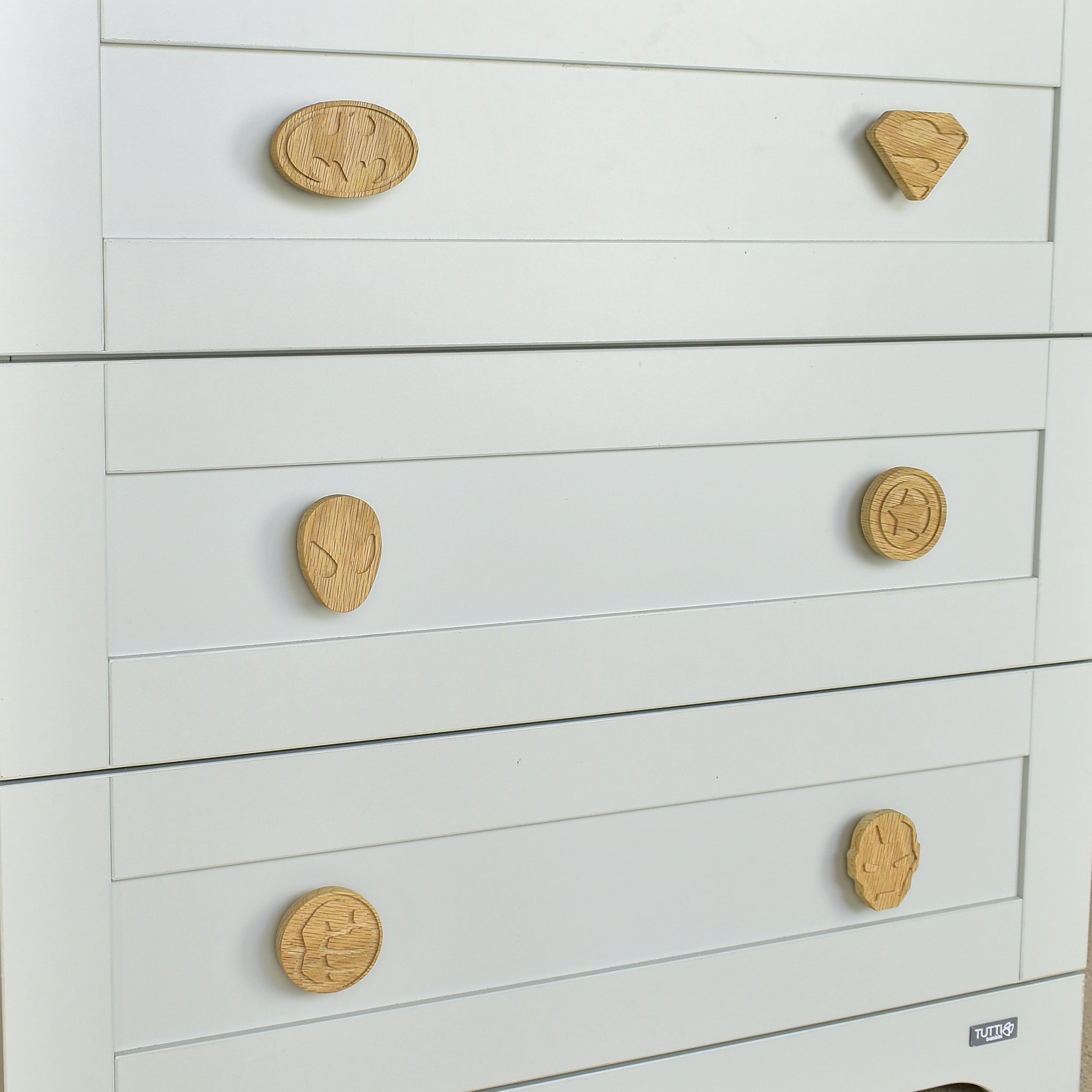 Superhero drawer knobs close-up left angle - Batman Superman Spiderman Captain America Hulk Iron Man oak