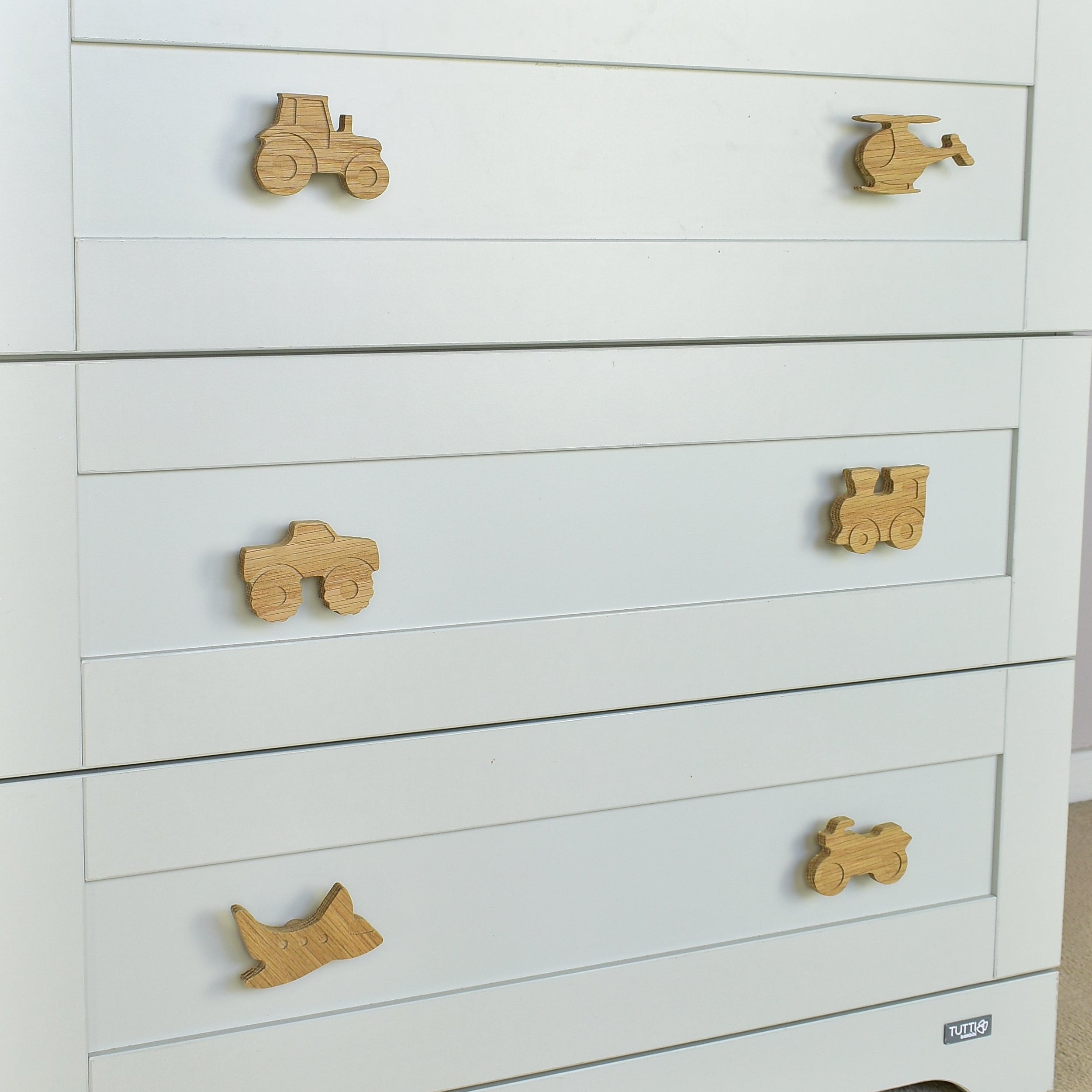 Transport oak drawer handles close-up left angle - tractor helicopter monster truck train aeroplane motorbike handcrafted detail