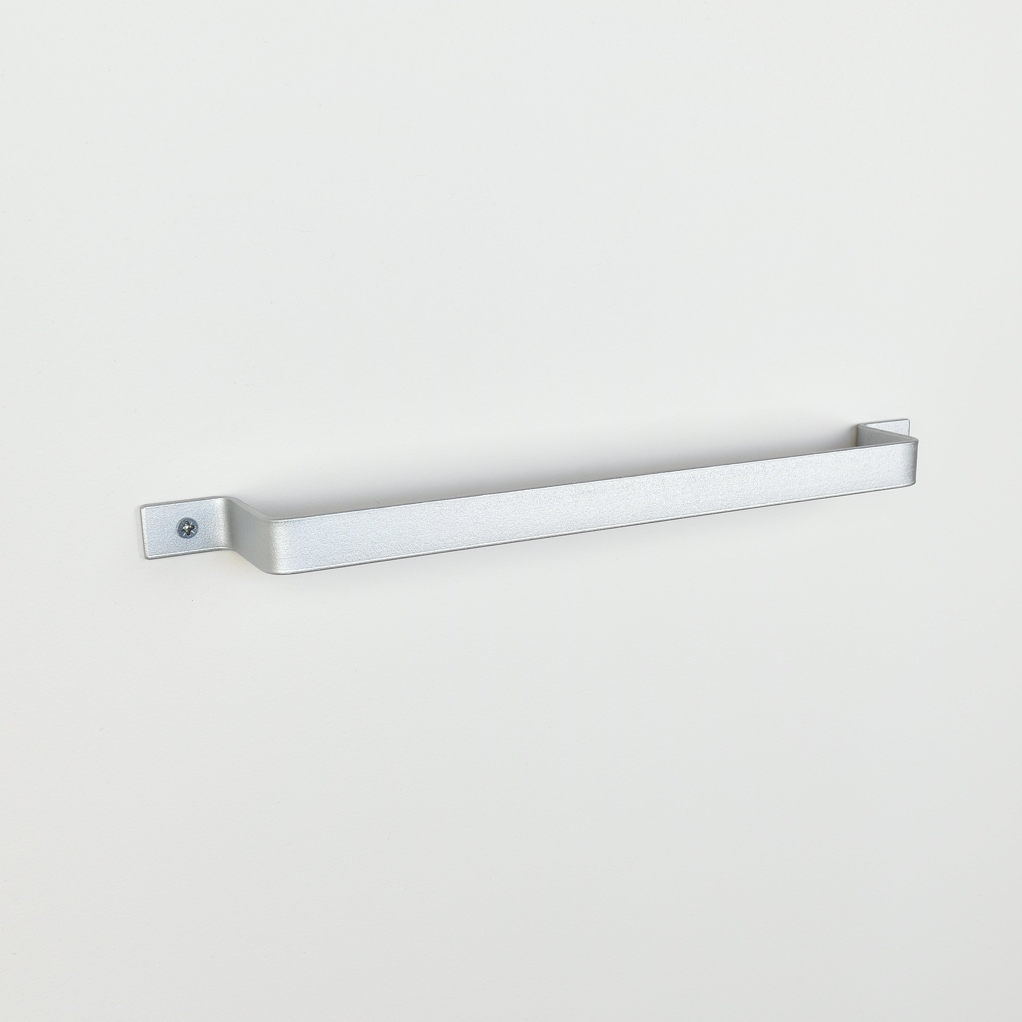 Left angle view of silver metal towel rail showing wall projection and mounting detail - durable bathroom hardware