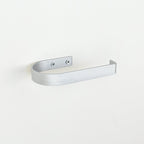 rounded edge silver metal toilet roll holder with a white background - left view