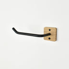 black steel bar with oak fixing toilet roll holder right view showing close up of fixing