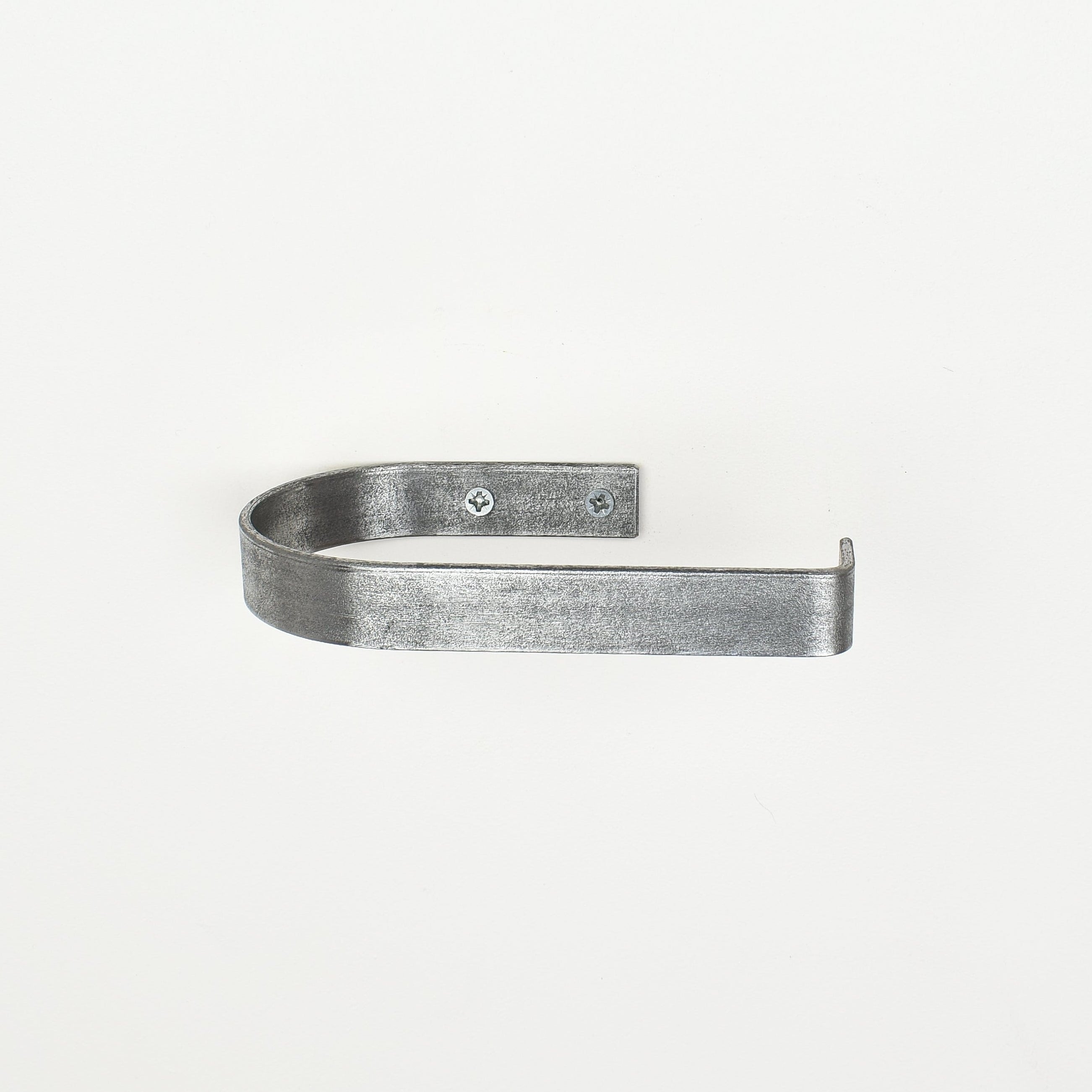 rounded edge pewter metal toilet roll holder with a white background - front view