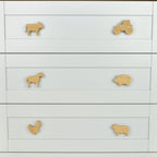 Farmyard oak drawer handles close-up front view - tractor cow horse pig chicken sheep kids nursery decor 