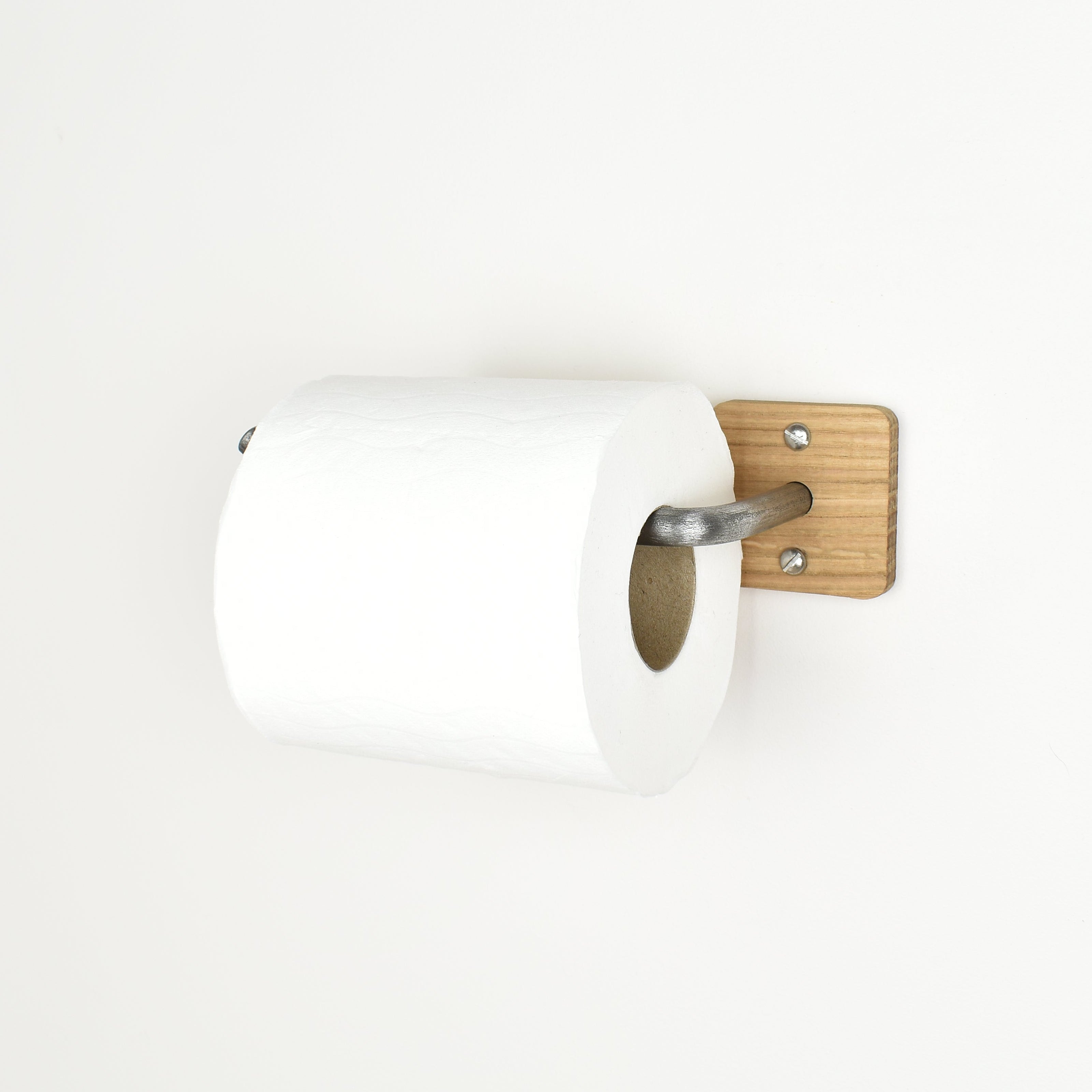 oak toilet paper holder with a roll of toilet paper on a white background