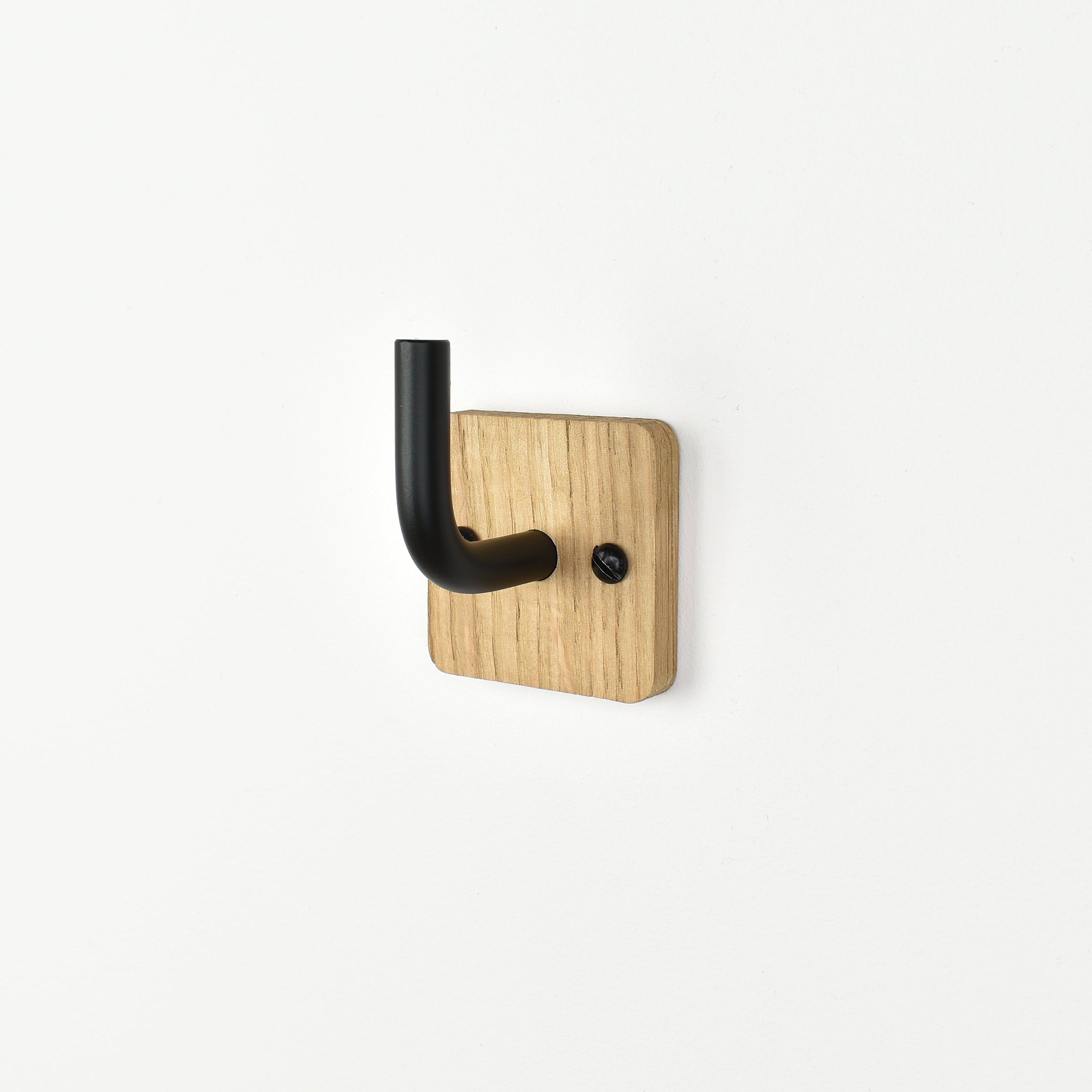 solid oak wall hook with black metal bar - side view