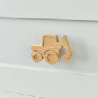 Oak digger drawer knob fitted to a white chest of drawers showing natural wood grain