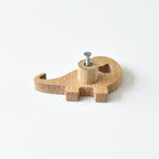 Back of oak dinosaur drawer knob showing threaded insert and fixing screw