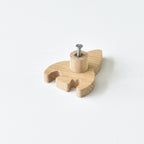Back of oak rocket drawer knob showing threaded insert and fixing screw