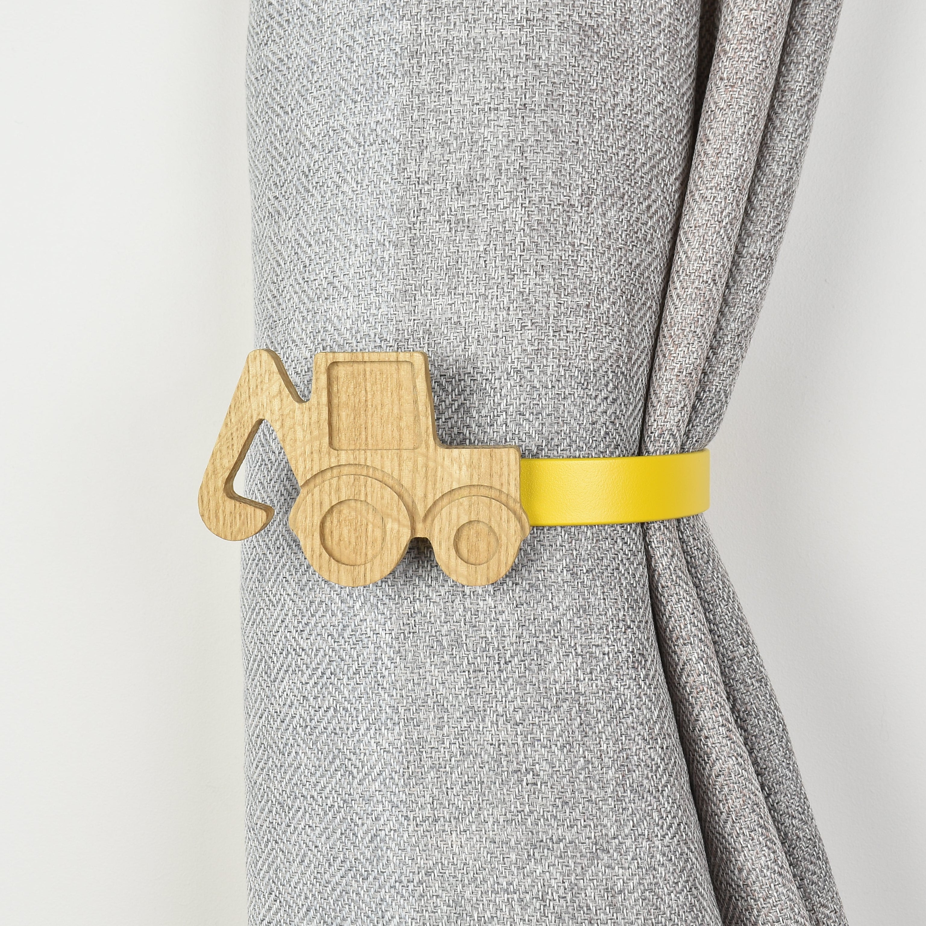 Wooden construction truck shaped curtain tieback