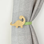 Wooden dinosaur shaped curtain tieback