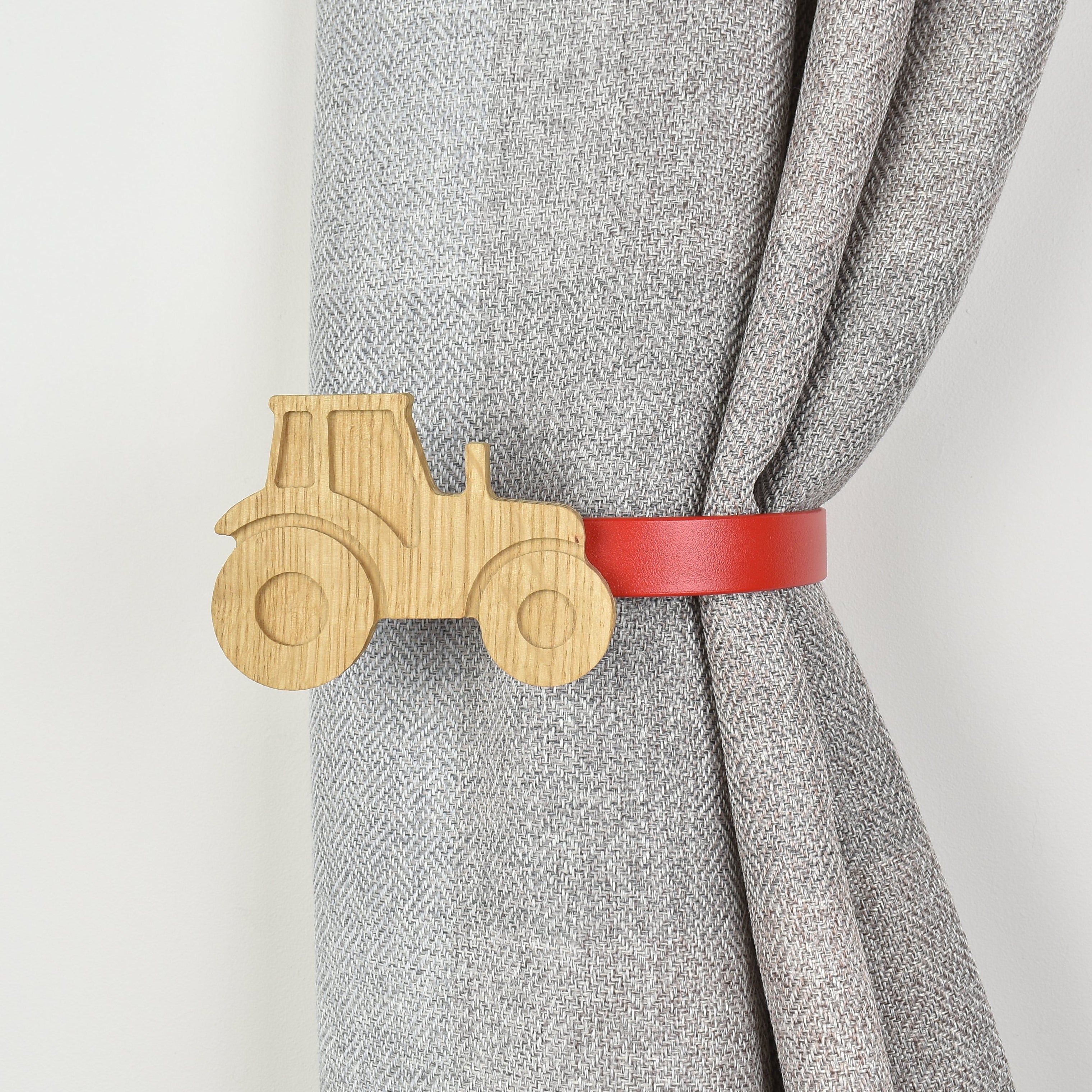 Wooden tractor shaped curtain tieback