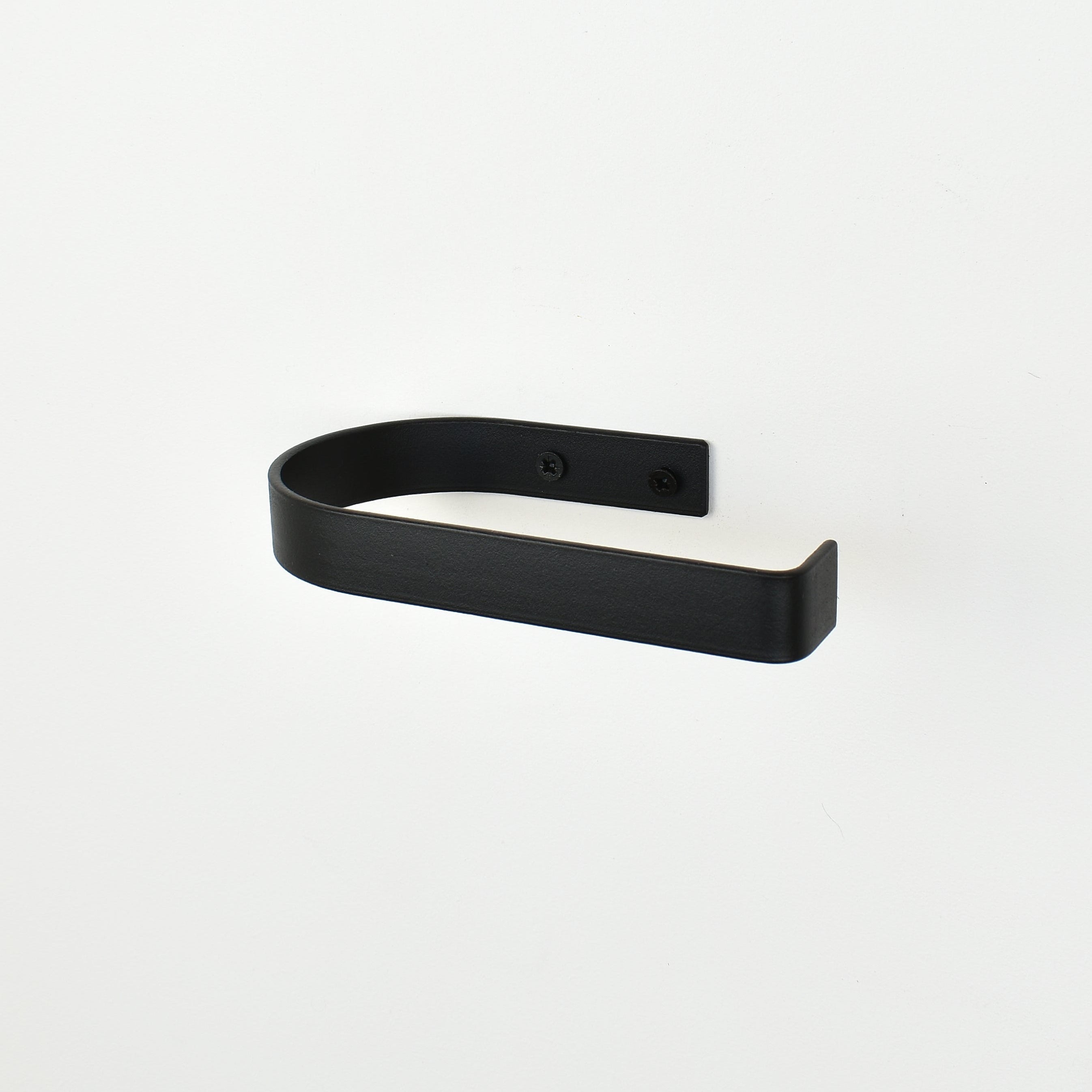 rounded edge black metal toilet roll holder with a white background 